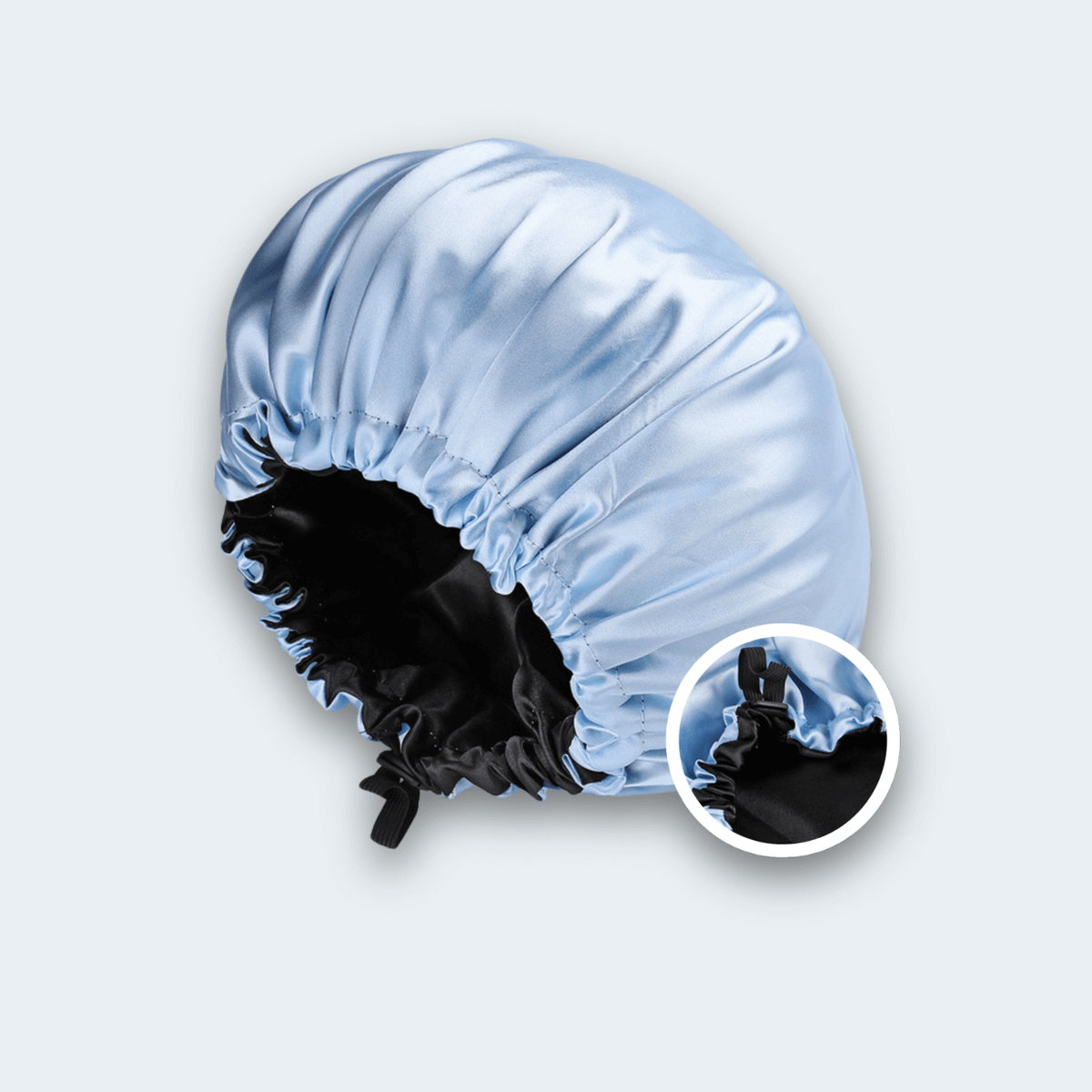 DreamCap Satinhaube in Sky Blau, wendbar mit schwarzem Innenfutter