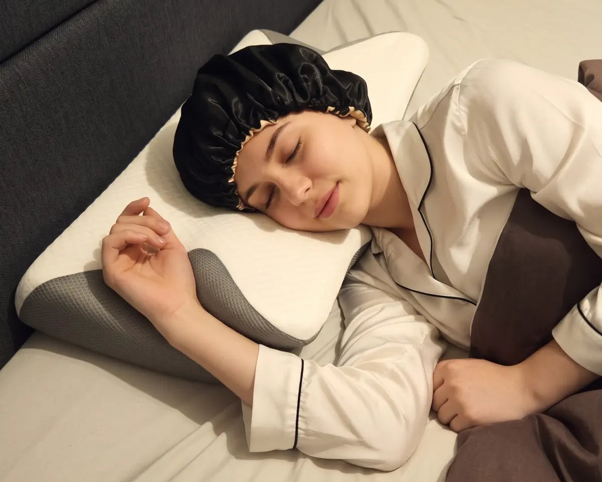 A person sleeping on their side on the SleepFit, the arm resting in the side cut-out.